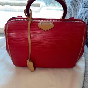 Louis Vuitton Doc BB Bag crafted in Coquelicot Epi Leather